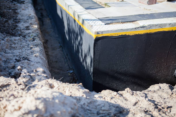 Professional Waterproofing technician working in Depew, NY